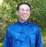 Grandmaster Wong smiles, full of spiritual joy